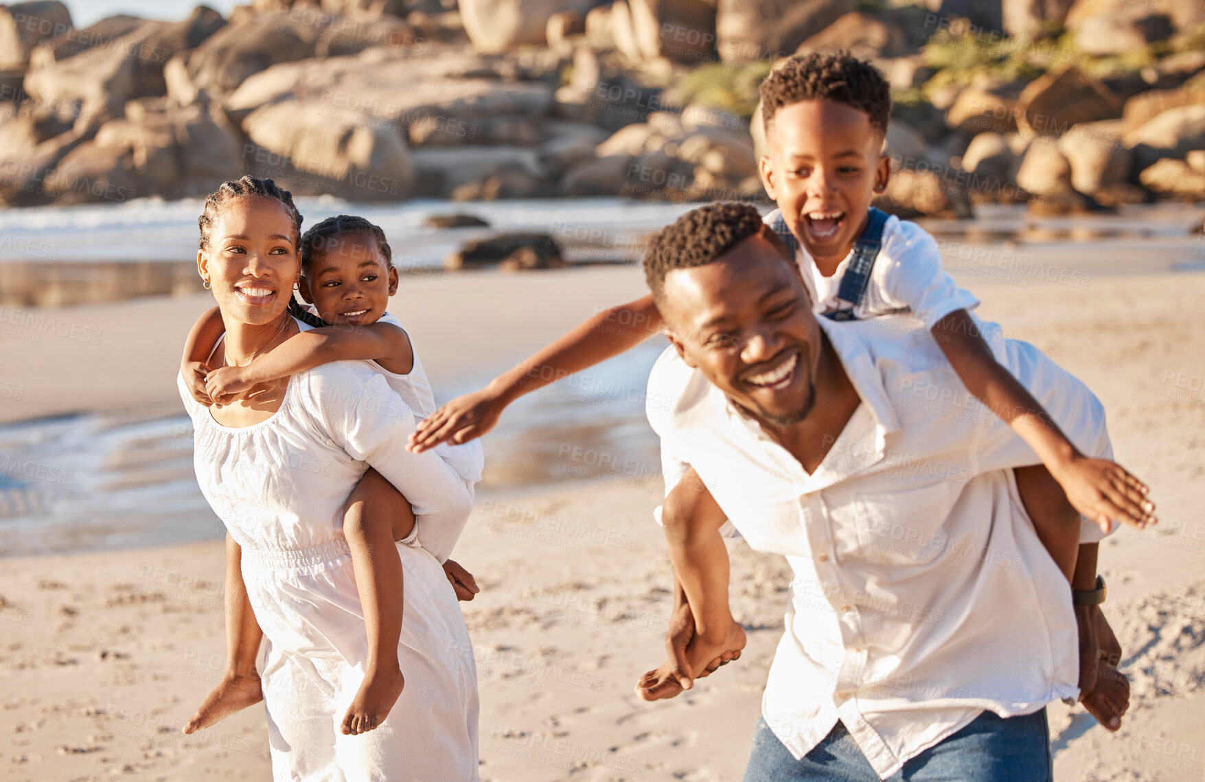 Buy stock photo Piggyback, happy and black family at beach for fun on tropical vacation, travel or getaway. Smile, bonding and African children playing with parents by ocean on holiday, adventure or weekend trip.