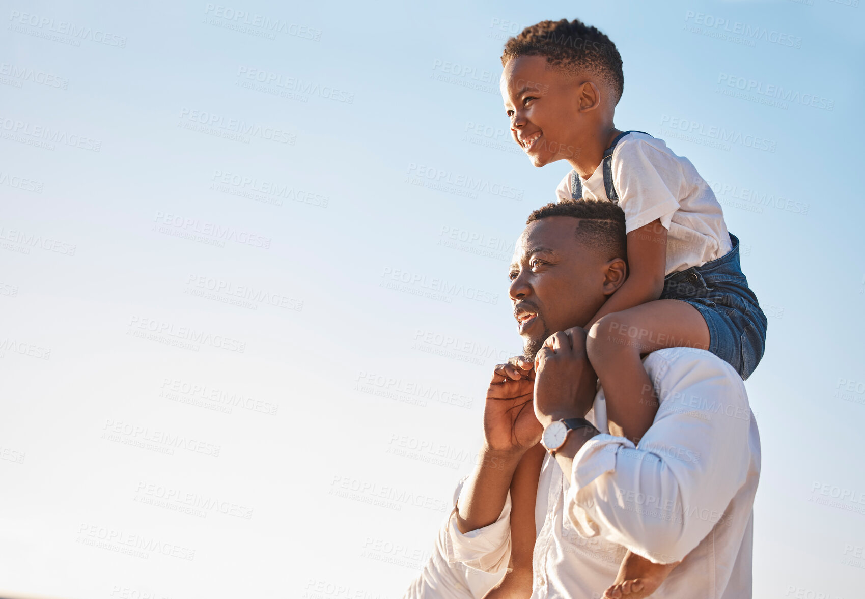 Buy stock photo Father, boy and carrying outdoor for bonding, travel and vacation with support, care and sunshine. Dad, son and shoulder ride for relationship, adventure and holiday with blue sky, happiness and fun