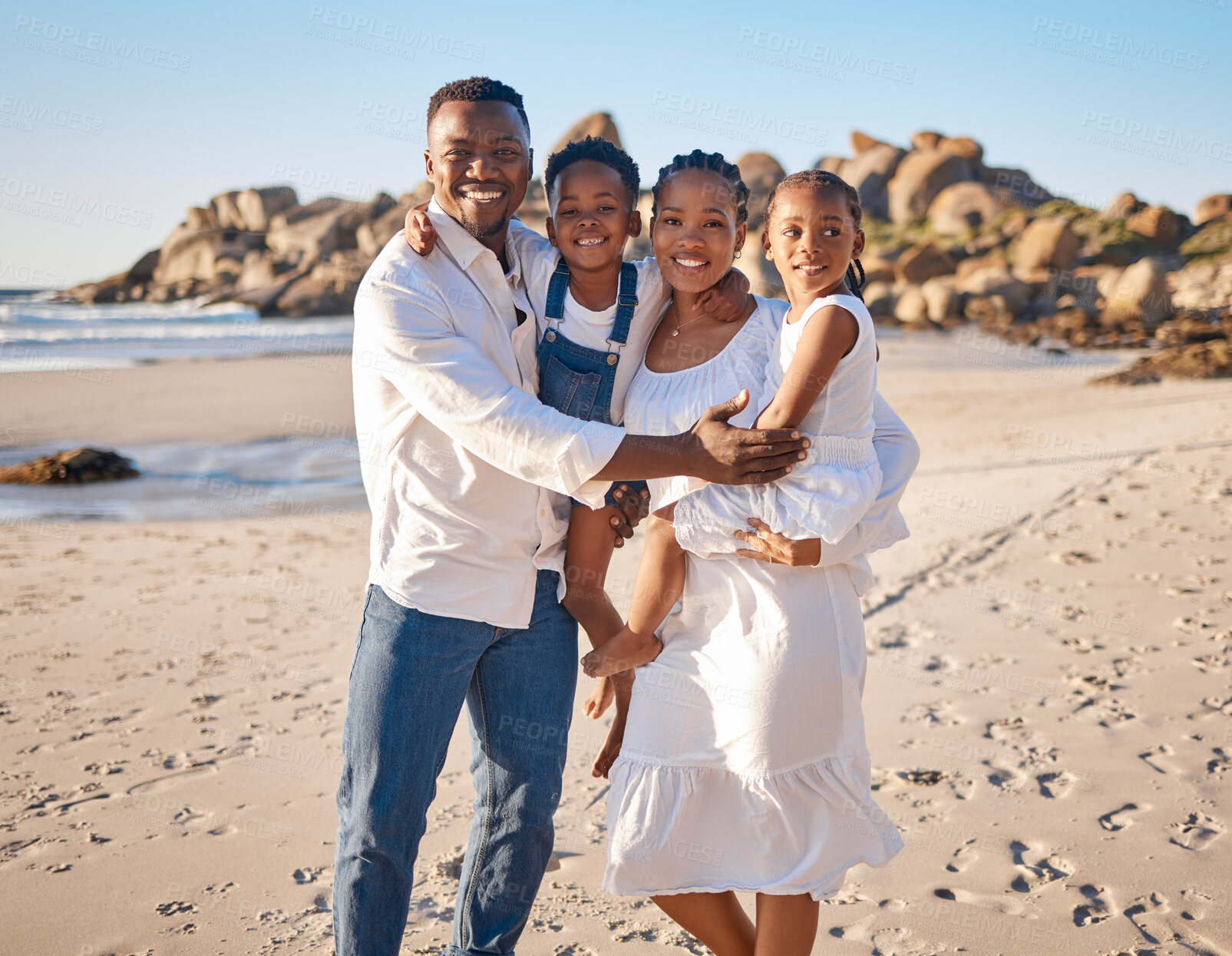 Buy stock photo Black family, portrait and happy with children at beach for weekend trip, holiday and adventure. Smile, mother and father with kids by ocean for summer vacation, love and outdoor travel in Mauritius