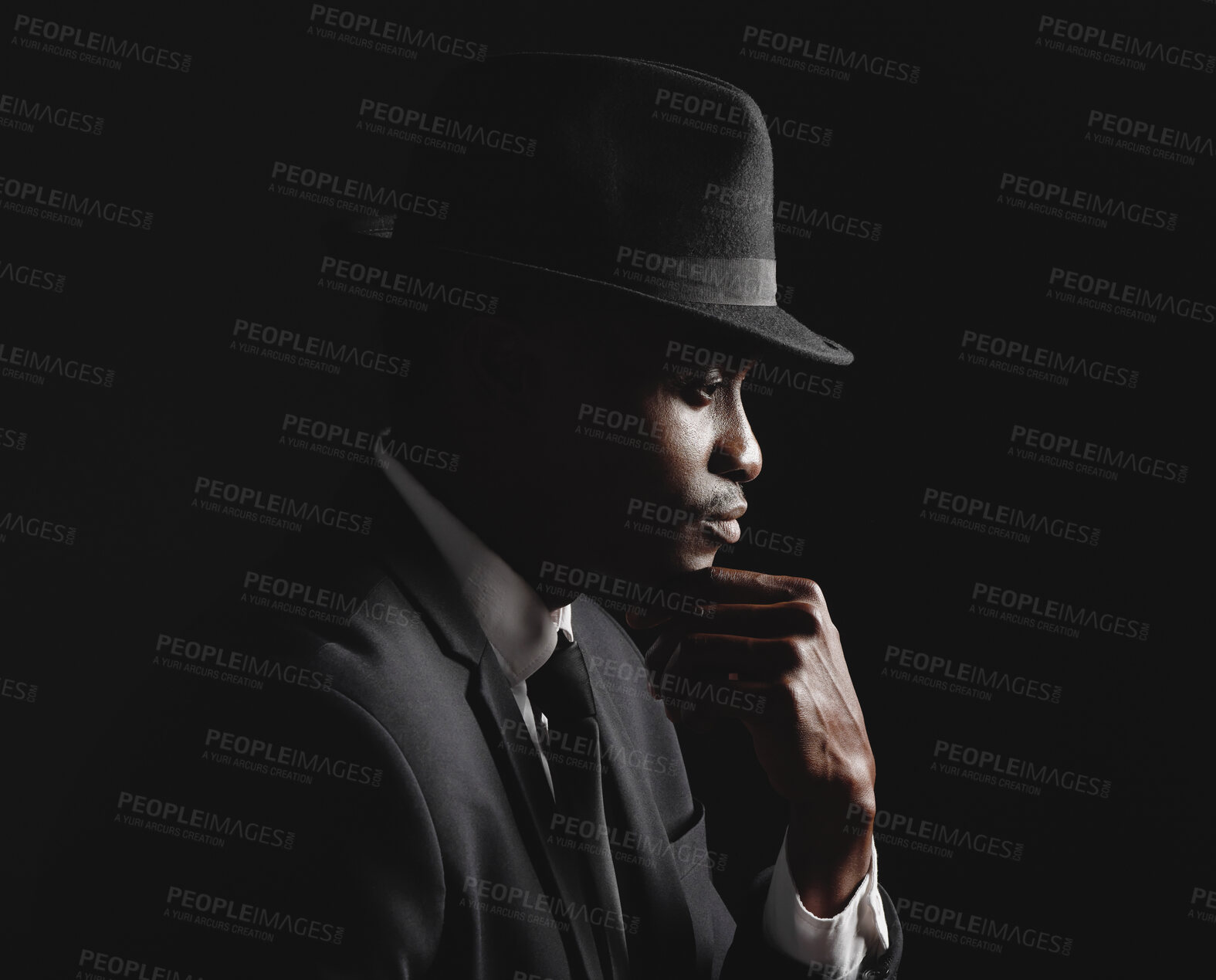 Buy stock photo Thinking, black man and mysterious with suit in dark background for fashion, elegant clothes and crime boss of mafia. Male person, thought and formal outfit for secret spy, security and trendy hat