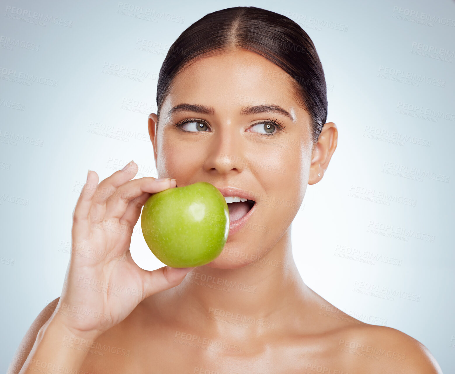 Buy stock photo Beauty, thinking or woman with apple for healthy nutrition, skincare or snack on white background in studio. Food diet, fruit or face of happy girl eating for detox or vitamin c for organic benefits