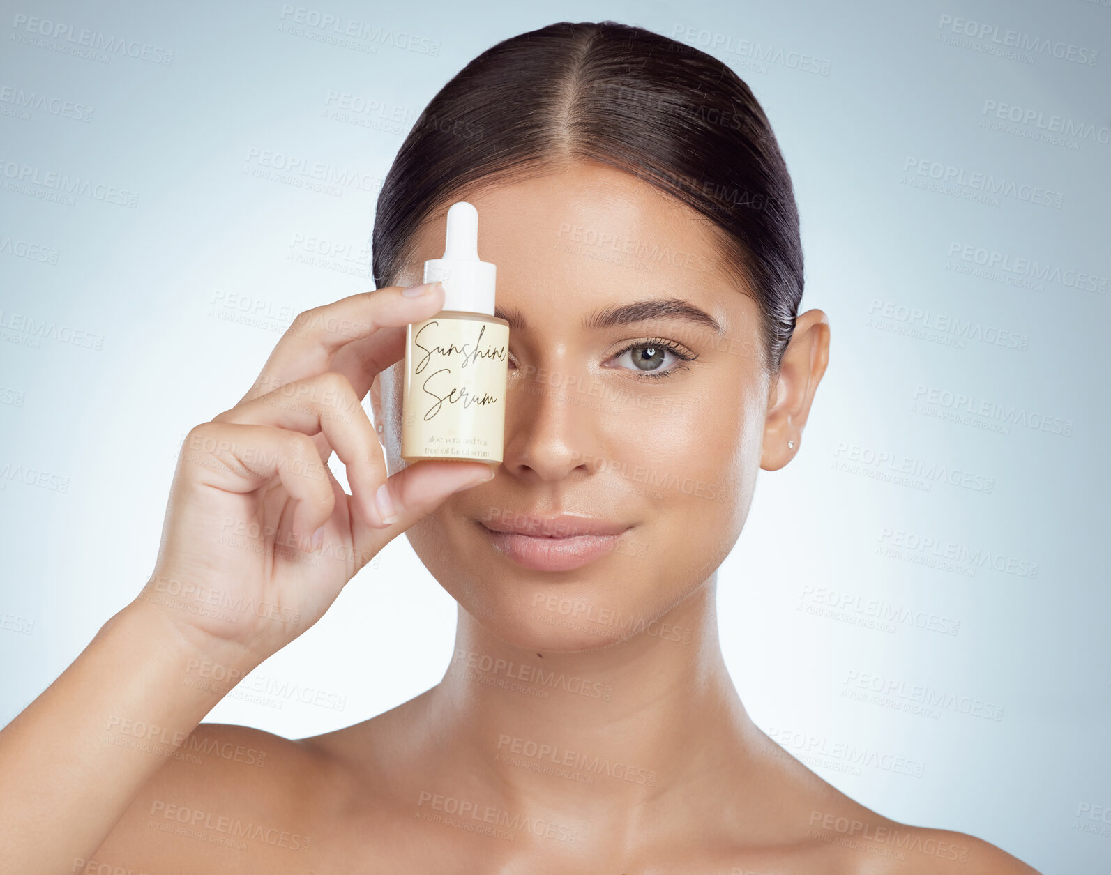 Buy stock photo Portrait, skincare and woman with serum bottle by eye for vitamin c and cosmetic beauty. Face, product or show hyaluronic acid, essential oil or chemical peel for benefits on white studio background.