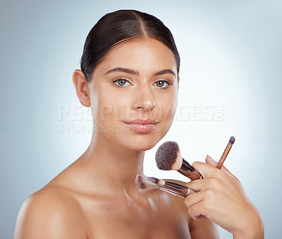 Buy stock photo Makeup artist, portrait or woman in studio with brush foundation routine, product or tools for skin. Cosmetic, smile and model with beauty equipment for face cosmetology treatment on white background