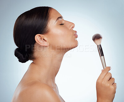 Buy stock photo Makeup artist, kiss or girl with brush foundation routine, product or tools for skin in studio. Pout, woman or profile of model with beauty equipment for face cosmetics treatment on white background