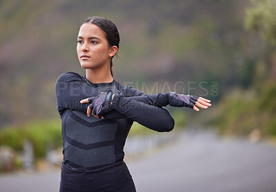 Buy stock photo Fitness, woman and stretching arms in road with getting ready for workout, exercise and morning run in nature. Athlete, runner and serious with warm up in street for marathon, performance or wellness