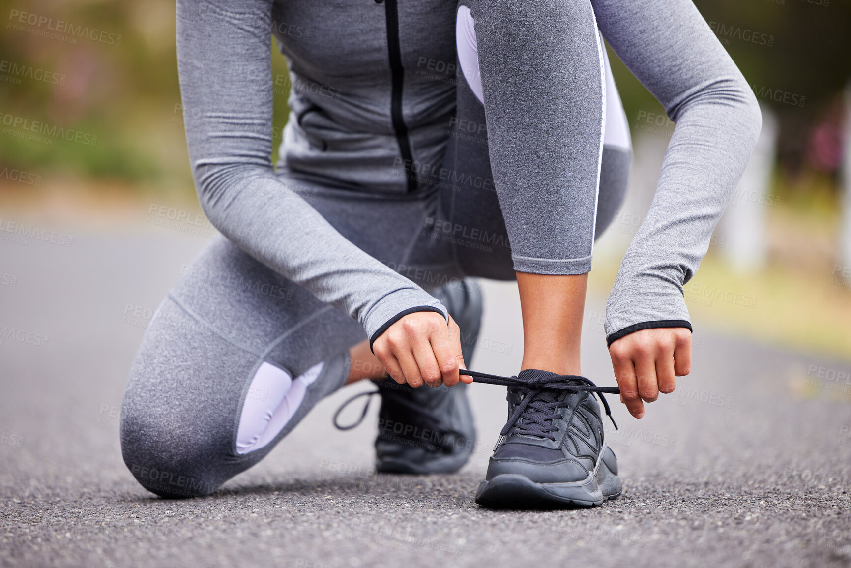 Buy stock photo Hands, shoes and lace for fitness, ready and exercise outdoor as person with start of marathon training. Athlete, sneakers and tying shoelace in morning for workout, running and sports on road    