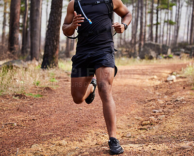 Buy stock photo Running, man and body with fitness in forest for cardiovascular health, exercise and endurance. Athlete, person and trees with workout in nature for wellness, sports and training for weekend marathon