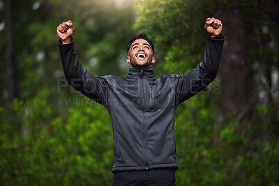 Buy stock photo Celebrate, fitness and man in nature for running, marathon training and exercise goals outdoors. Sports, mountain and happy person with hands up for success for performance, health and wellness