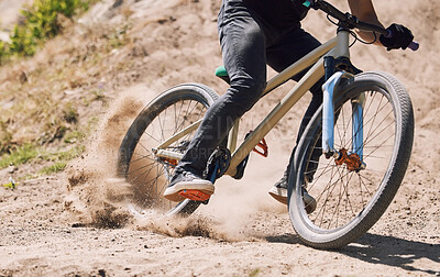 Buy stock photo Action, sand and person on bicycle for riding, fitness and exercise outdoor with race, speed or dirt. Athlete, performance and off road mountain bike cycling for adventure, sport or workout in nature