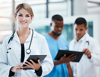 Buy stock photo Science, innovation and health care with leading doctors working on digital tablet, planning together. Diverse healthcare professionals discussing medicine, treatment researching a cure for cancer