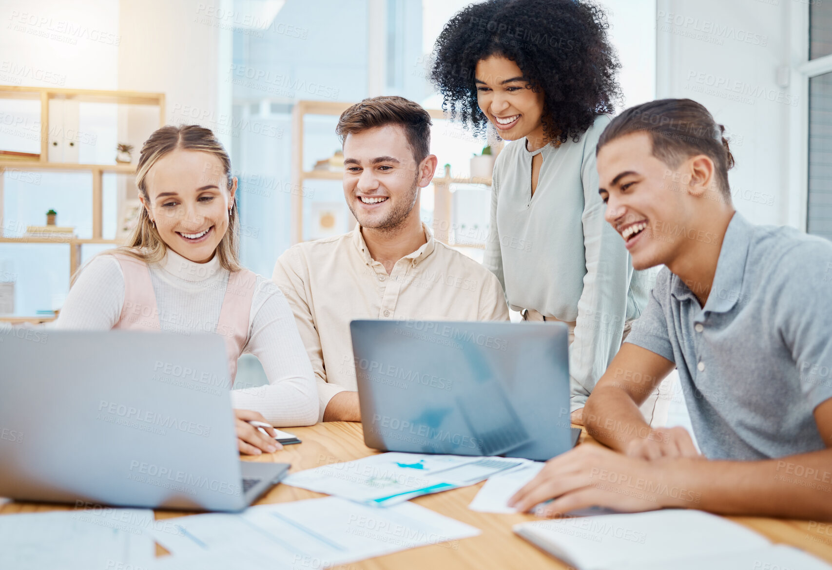 Buy stock photo Happy team collaboration and teamwork by business people watching a laptop and waiting for results or feedback. Diverse group online project with web developers trying new cad technology in an office