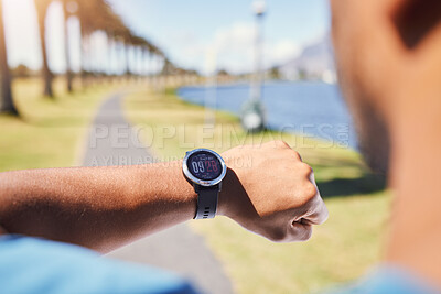 Buy stock photo Watch, man hand and fitness gear for time, training and cardio results for wellness monitor on app. Outdoor, running and park with equipment to check performance for heart rate, workout and pulse.