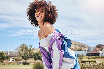 Buy stock photo Outdoor, hipster and woman in portrait for fashion, stylish and cool with confidence in Spain. City, female person and curly hair with trendy sunglasses on vacation, holiday and edgy for accessory