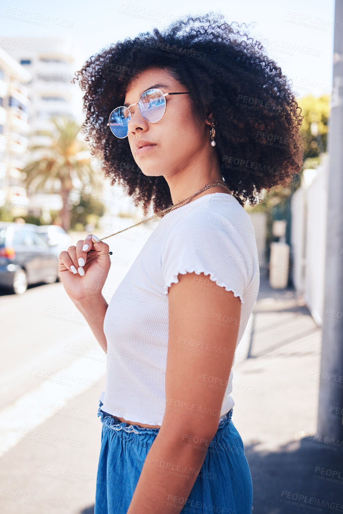 Buy stock photo Fashion, sunglasses and girl with necklace in city for trendy, urban style or vision. African woman, cool or outdoor with jewelry, reflection or thinking of accessory for summer holiday in streetwear