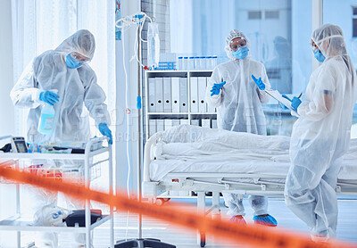 Buy stock photo Biohazard, sanitation and people with disinfection in hospital for contamination, safety and protocol. Medical, red tape and worker with PPE in ward for healthcare, protection and infection control