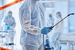 Closeup on hand of biohazard cleaner holding antiseptic equipment. csi member cleaning a hospital room. Biochemist sterilise covid quarantine room. Specialist cleaning bacteria from hospital