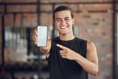 Buy stock photo Phone screen, point and portrait of man in gym for fitness app, membership and software download. Happy, person and tech with mockup space for training program, exercise and online registration info