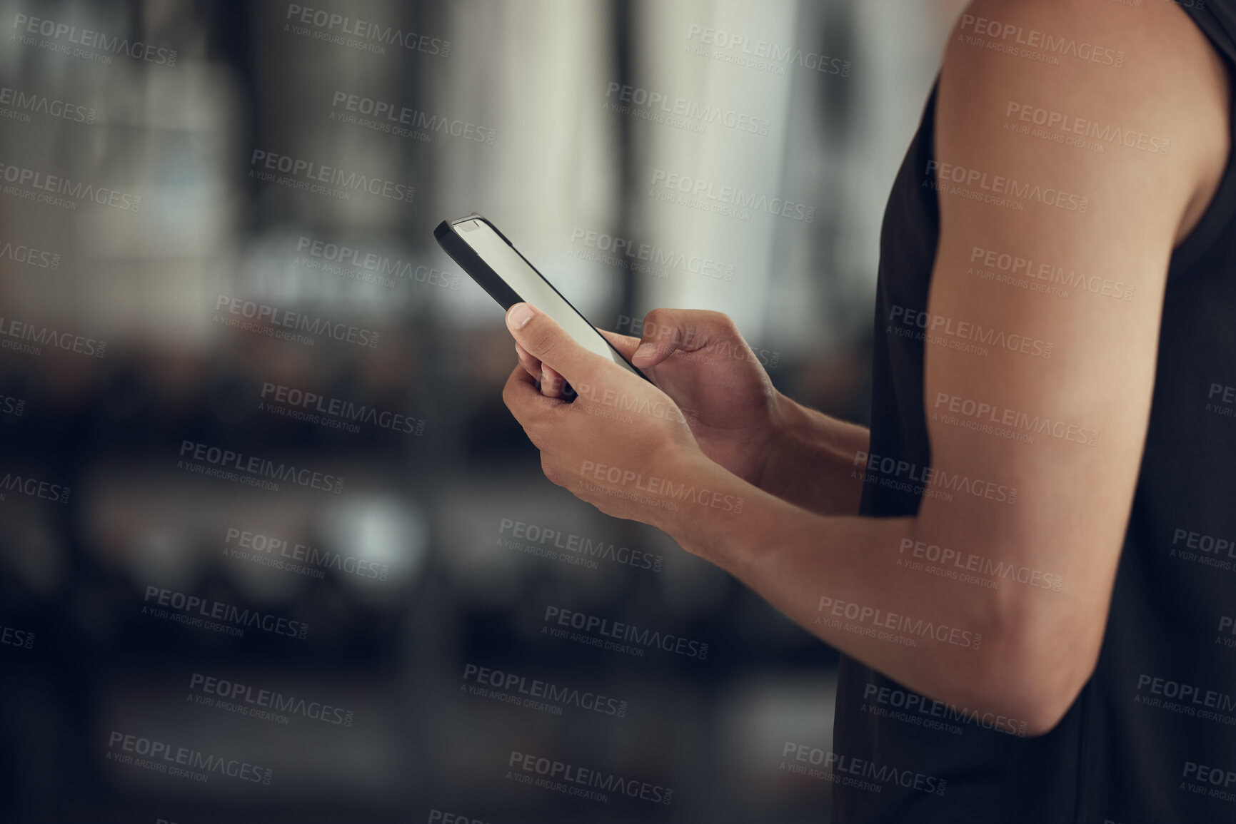 Buy stock photo Fitness, hands and person with phone at gym for tracking workout progress, exercise app and reading notification. Athlete, space and smartphone at sports club for training website and wellness tips