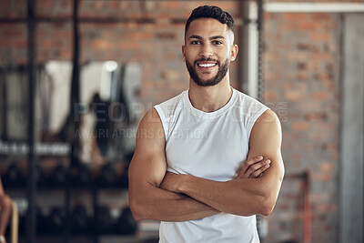 Buy stock photo Man, portrait and confident in gym for exercise or daily workout routine, muscle growth and development. Male person, arms crossed and happy with pride in studio for fitness, cardio and training.