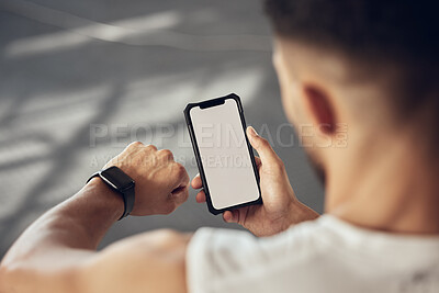 Buy stock photo Man, fitness and checking with phone screen or smartwatch for tracking, performance or progress at gym. Male person with wristwatch and smartphone for training app, sync or health tracker on mockup