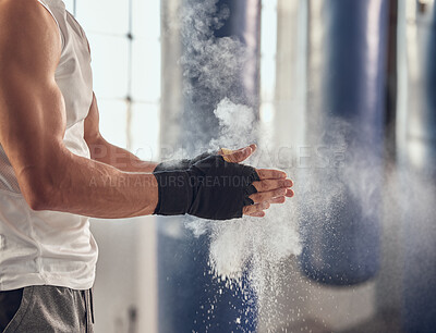 Buy stock photo Man, boxer and hands with chalk or gloves in preparation for workout, exercise or training at gym. Closeup of male person, athlete or fighter getting ready with powder or dust for boxing practice