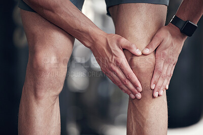 Buy stock photo Gym, knee pain and man with fitness, hands and discomfort with muscle tension, strain and ache. Closeup, person or athlete with leg injury, inflammation or orthopaedic problem with training or sports