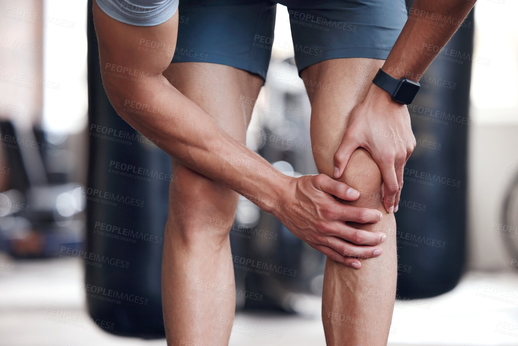 Buy stock photo Gym, knee pain and man with exercise, hands or discomfort with muscle tension, strain or ache. Closeup, sports or athlete with leg injury, inflammation or orthopaedic problem with training or fitness