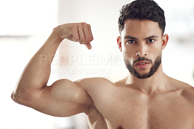 Buy stock photo Portrait, man and flex bicep for fitness, pride or results of workout progress with topless athlete in gym. Face, bodybuilder or show strong muscle for power, serious or confidence for healthy growth