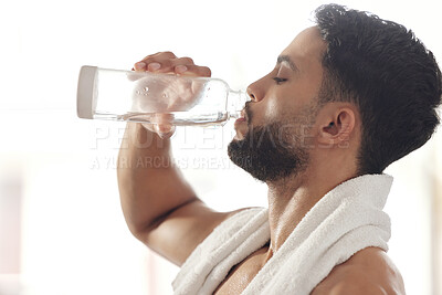 Buy stock photo Profile, man and drinking water for fitness at gym with towel for break, hydration and detox. Male person, thirsty and satisfied on body building with exercise, training and workout for self care