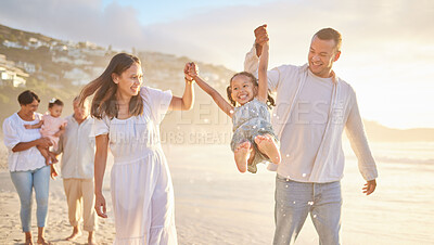 Buy stock photo Beach, family and parents lifting kid on vacation, adventure or getaway together for bonding by sea. Happy, generations and children with grandparents and mom and dad for fun by ocean on holiday.
