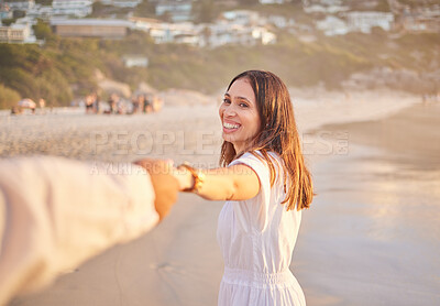 Buy stock photo Smile, couple and holding hands on beach with love, bonding and romance date for tropical travel in Greece. Happy, woman and man with support of relationship, commitment and loyalty for ocean sunset