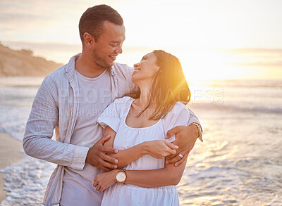 Buy stock photo Couple, smile and hug on beach with love, bonding and romance date for tropical travel for marriage. Happy, woman and man with embrace of relationship, commitment and loyalty of ocean sunset outdoor