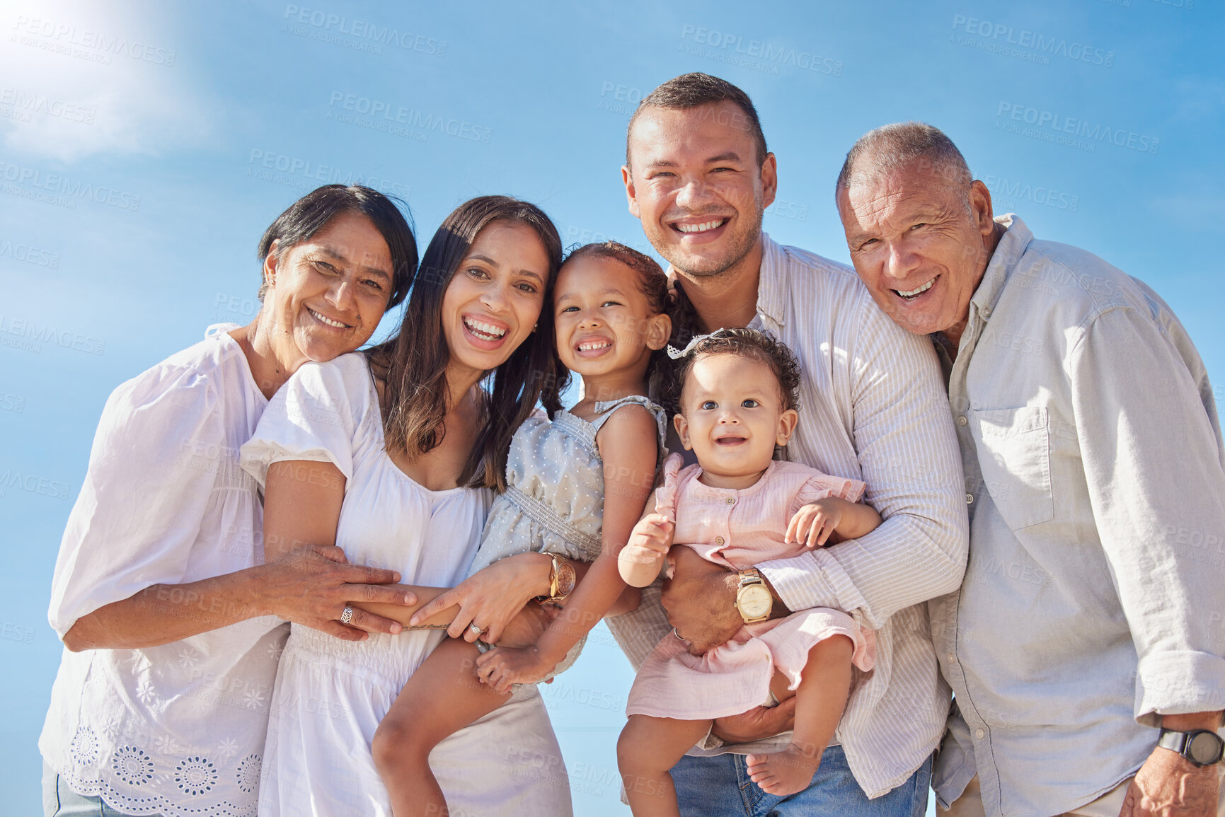 Buy stock photo Portrait, big family and happy in vacation, sky and travel for bonding, outdoor and grandparents with smile. Relax, man and woman with children for fun in holiday, group and fresh air in weekend