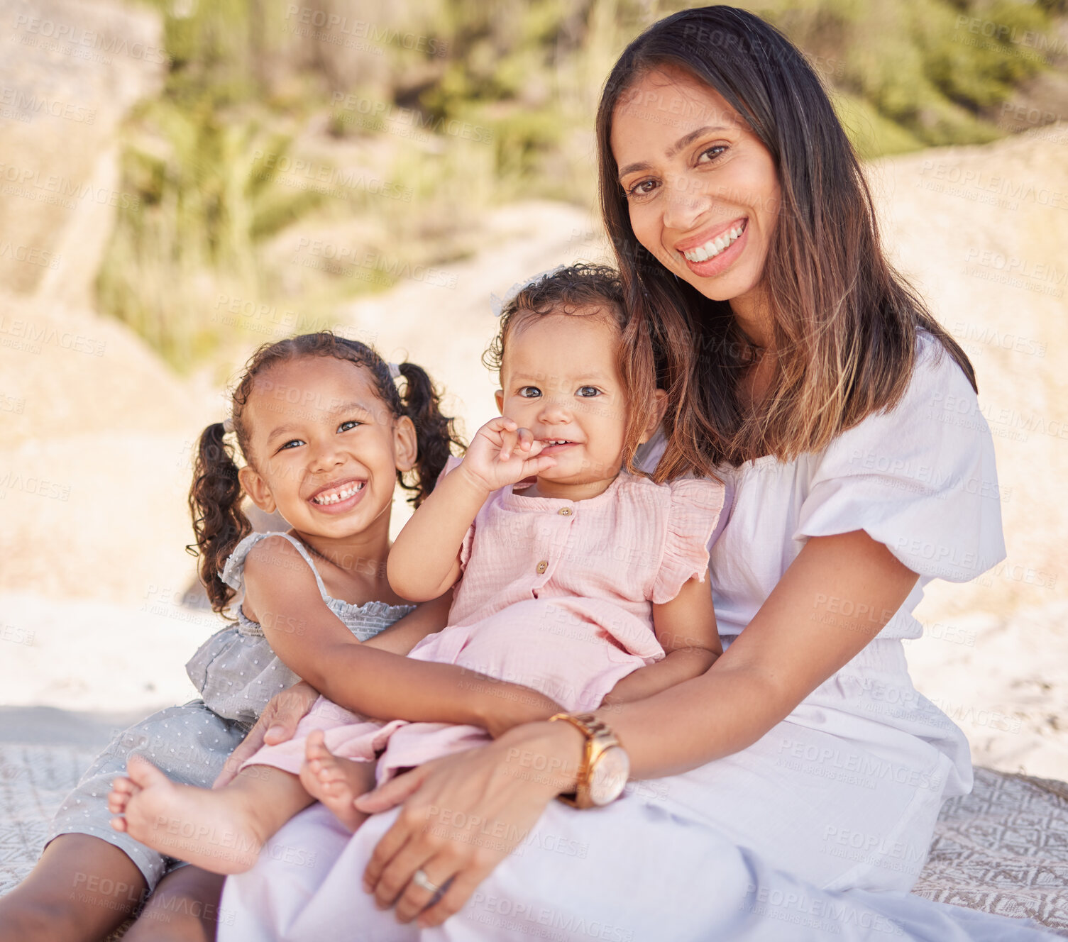 Buy stock photo Happy mother, portrait and children with hug on beach for picnic, bonding or outdoor holiday together. Mom, daughter and kids with smile for family time, vacation or weekend on coast in nature