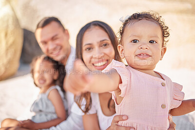 Buy stock photo Family, portrait and outdoor vacation to connect, love and bonding support in relationship. Parents, children and relax on holiday in nature together, weekend trip and playful baby on beach sand