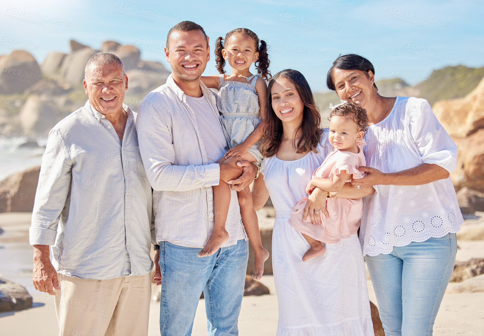 Buy stock photo Portrait, big family and happy in beach, travel and vacation for bonding, outdoor and grandparents with smile. Relax, man and woman with children for fun in holiday, group and fresh air in weekend