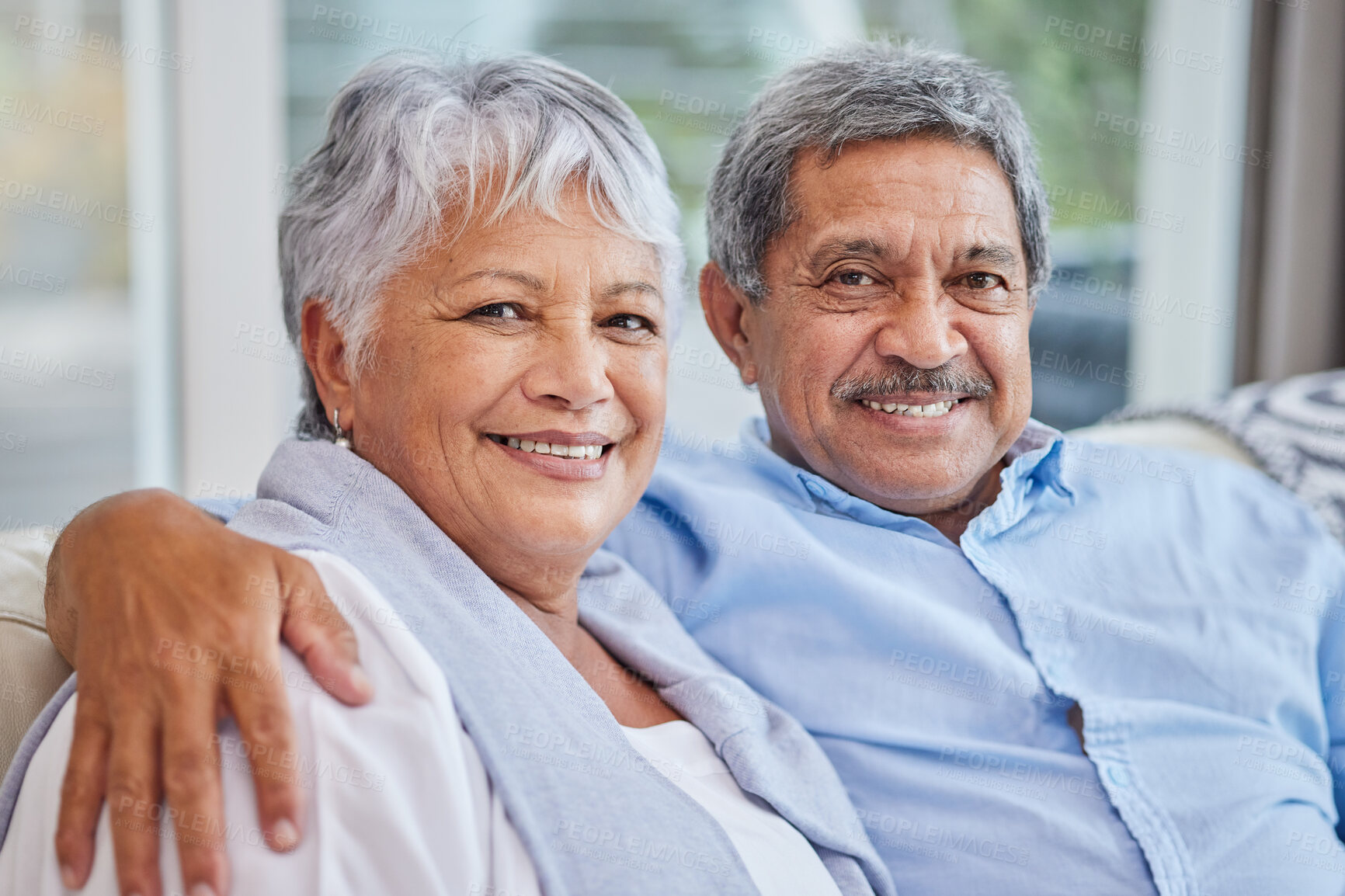 Buy stock photo Hug, love and portrait with elderly couple on sofa of home living room together for bonding. Marriage, relax or wellness with senior man and woman in apartment for relationship, retirement or romance