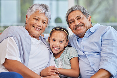 Buy stock photo Grandparents, girl and happy in home in portrait on sofa for love, support and bonding as pensioners. People, family and smile for visit on couch in living room with kid for fun, care and break