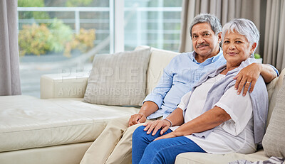 Buy stock photo Hug, love and portrait with senior couple on sofa of home living room together for bonding. Marriage, relax or security with elderly man and woman in apartment for relationship, retirement or romance