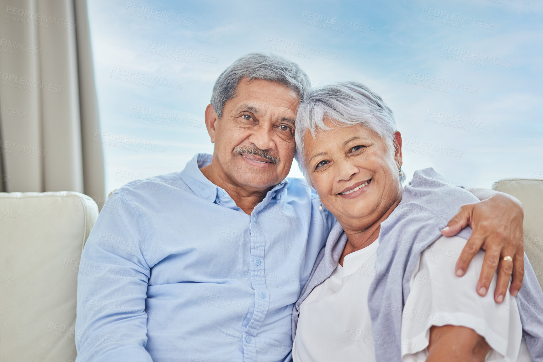 Buy stock photo Hug, portrait and smile with senior couple on sofa of home living room together for bonding. Happy, marriage or relax with elderly man and woman in apartment for relationship, retirement or romance