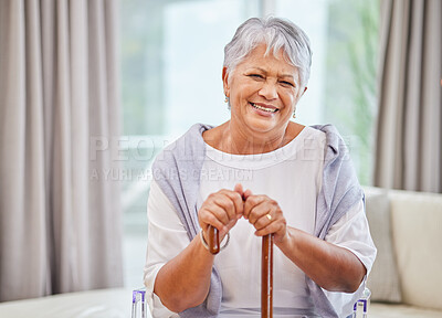 Buy stock photo Elderly woman, portrait and walking stick on sofa for mobility support, balance or homecare in retirement. Relax, smile or happy pensioner with cane for rehabilitation, recovery and injury assistance