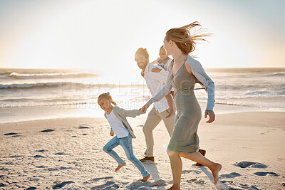 Buy stock photo Beach, family and running with kids at sunset for outdoor vacation, adventure and weekend trip. Happy, father and mother with children by ocean in summer for journey, travel and holiday in Florida