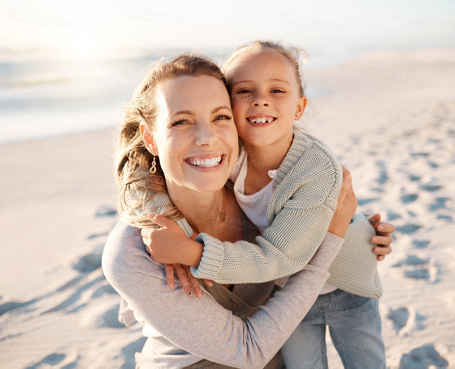 Buy stock photo Portrait, mother and child hug at beach with travel, holiday and summer vacation in Florida. Happy, smile and bonding by the sea with love, care and support on family trip by ocean with embrace