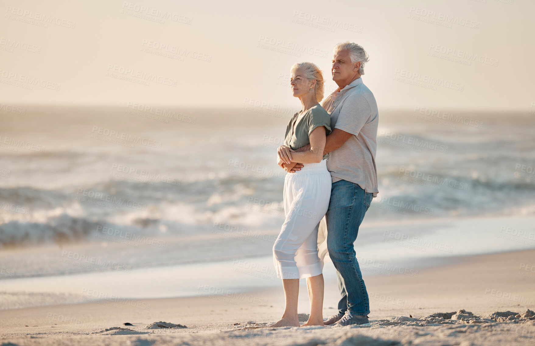 Buy stock photo Senior couple, hug and view by ocean for memory, love or bonding for connection on holiday in summer. People, man and woman for embrace, smile or retirement by waves on vacation at beach in Australia