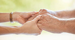 Closeup of an unrecognizable doctor offering their patient support during recovery. A loving unknown doctor holding the hand of her patient and showing kindness while doing a checkup at home