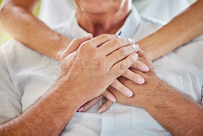 Buy stock photo Hug, holding hands and chest of senior couple for support, trust and comfort for care in home. Retirement, marriage and closeup of elderly man and woman together for kindness, help and wellness