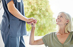 Closeup of an unrecognizable doctor offering their patient support during recovery. A loving unknown doctor holding the hand of her patient and showing kindness while doing a checkup at home