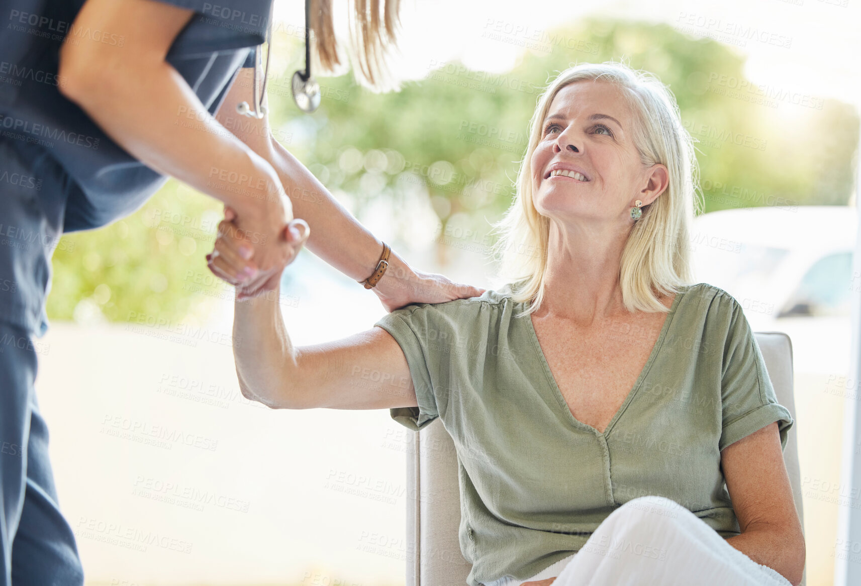 Buy stock photo Women, caregiver and senior patient with holding hand for help, support and happy with care at home. People, smile and satisfied with nurse for healthcare, recovery and trust with pensioner 
