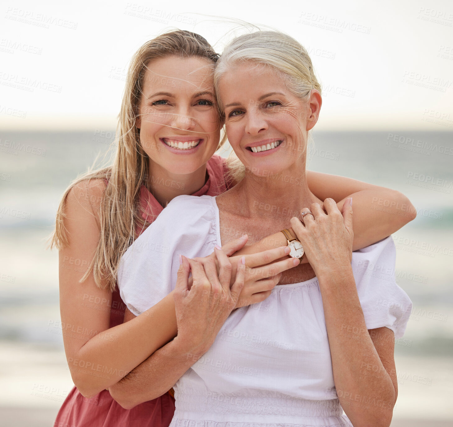 Buy stock photo Portrait, beach and hug with mother, daughter and travel with smile, bonding together and ocean. Face, family and senior person or girl with break, seaside or adventure with journey or summer holiday