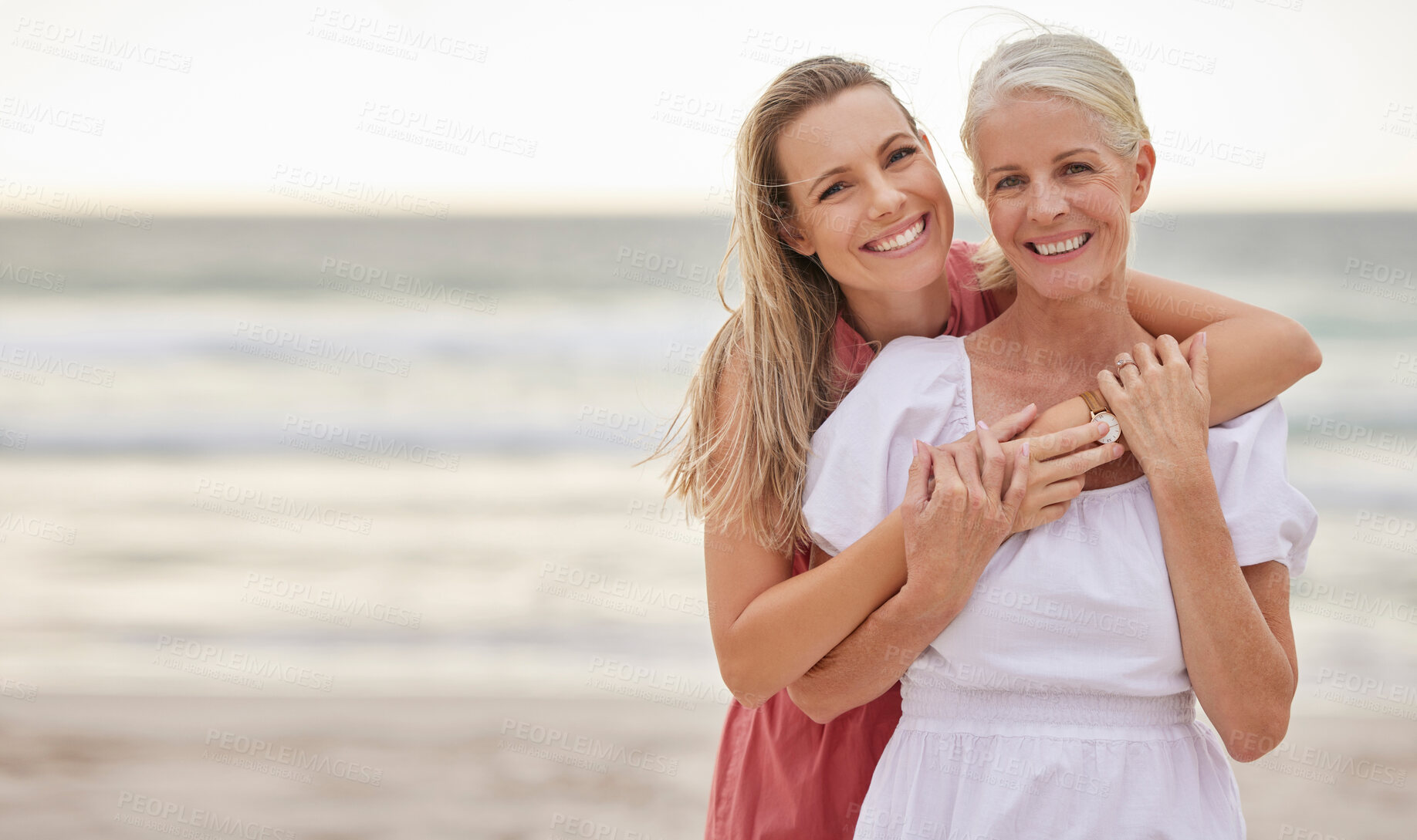 Buy stock photo Portrait, beach and senior mom with daughter for bonding holiday, love and embrace on weekend travel. Nature, mother and woman smile on ocean adventure together with hug, fun and vacation with mockup